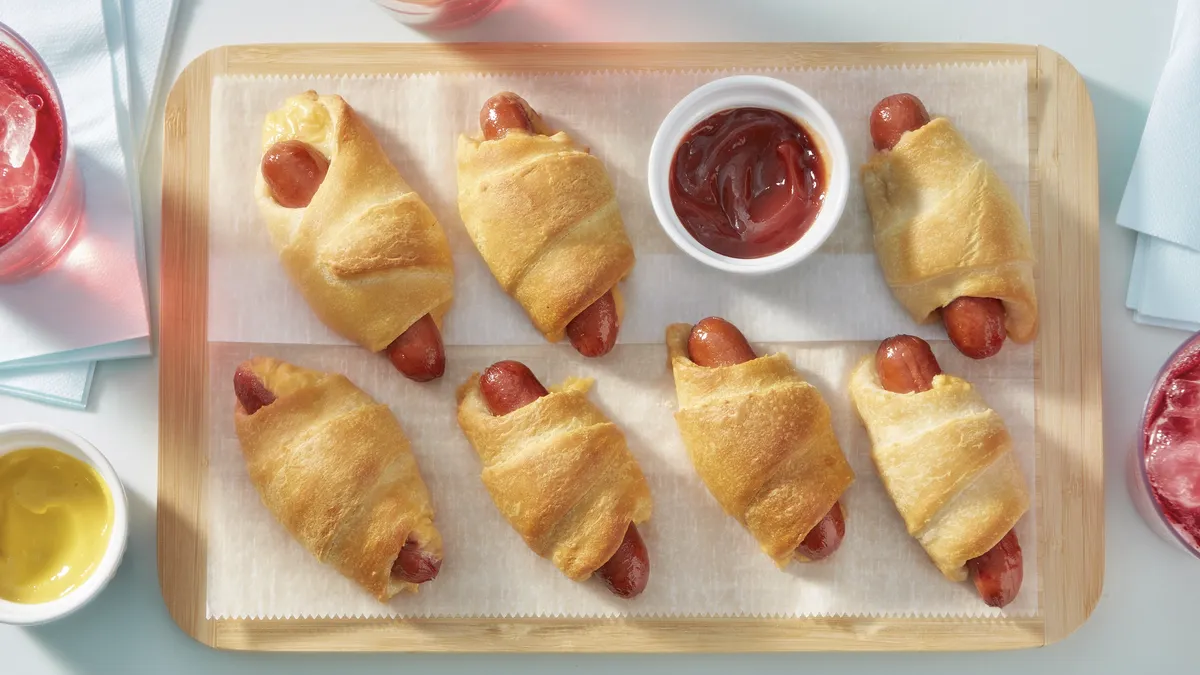Crescent dogs with a side of ketchup.
