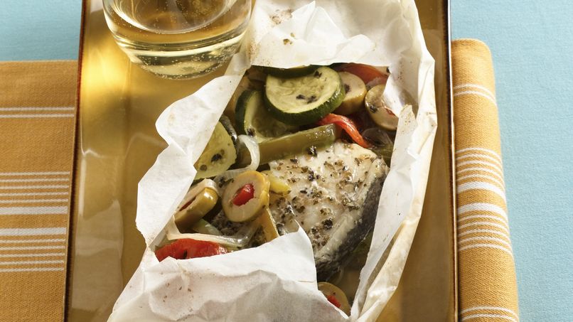 Paquetes de pescado al horno con vegetales