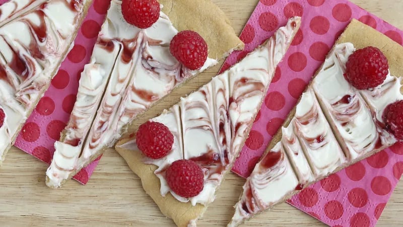 Raspberry Cheesecake Cookie Pizza