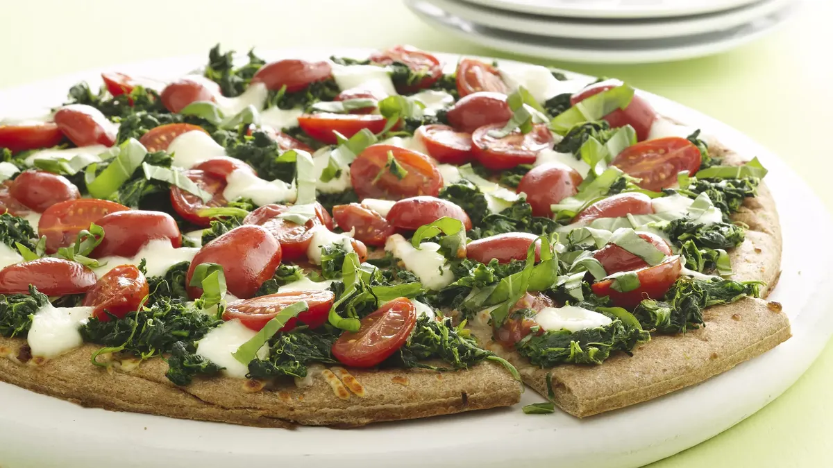 Spinach and Marinated Tomato Pizza