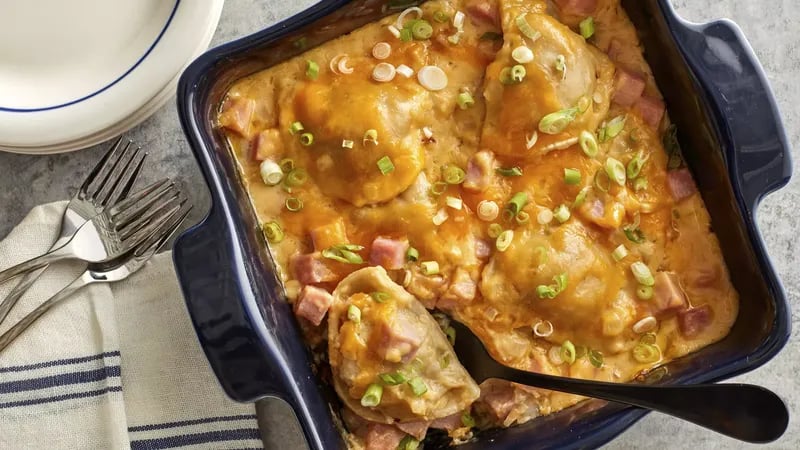 An appetizing ham and cheese casserole, ready to be served hot and bubbly.