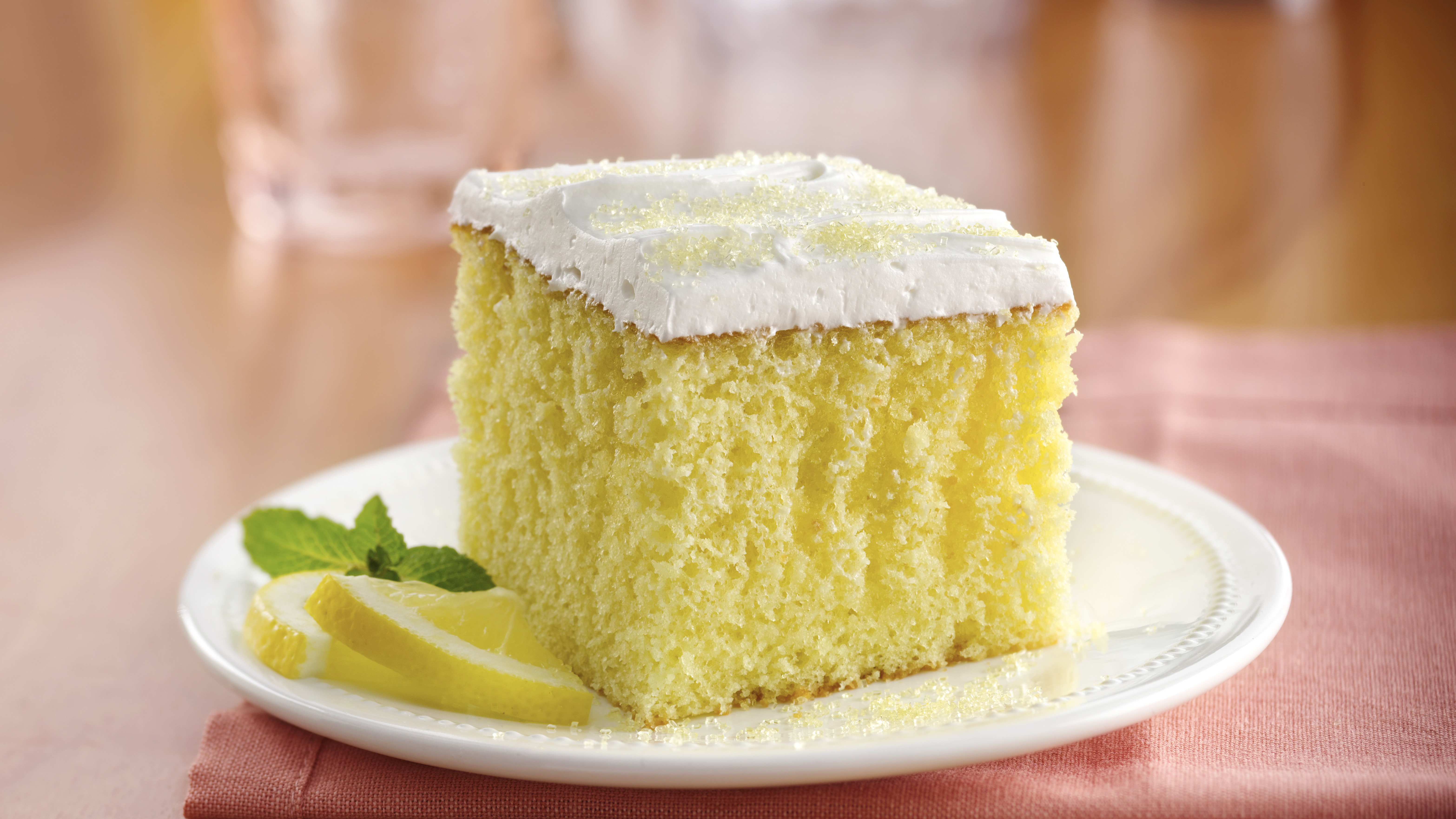 Lemon Sponge Cake with Vanilla Frosting Recipe | Kiersten Hickman