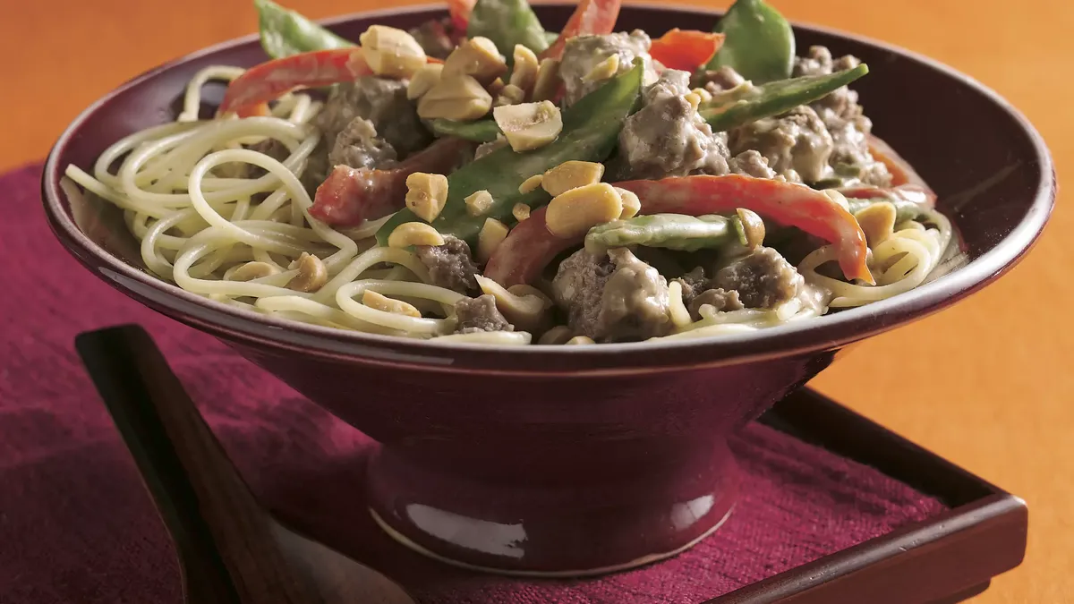 Thai Peanut Beef and Pea Pods Over Noodles