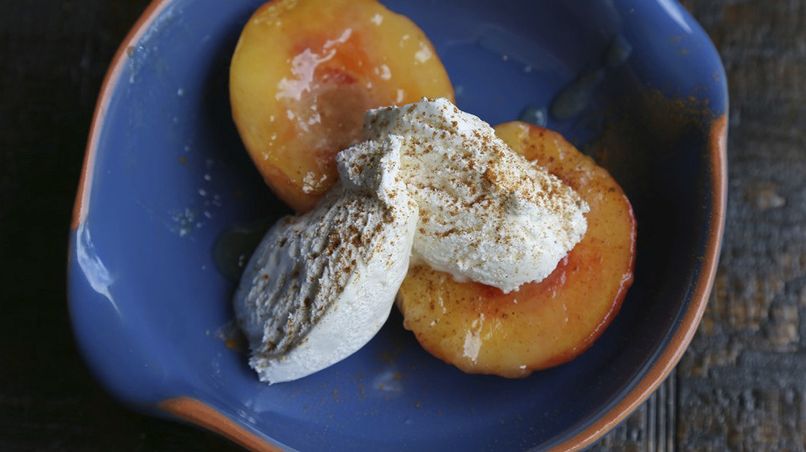 Cinnamon-Infused Baked Peaches with Cream