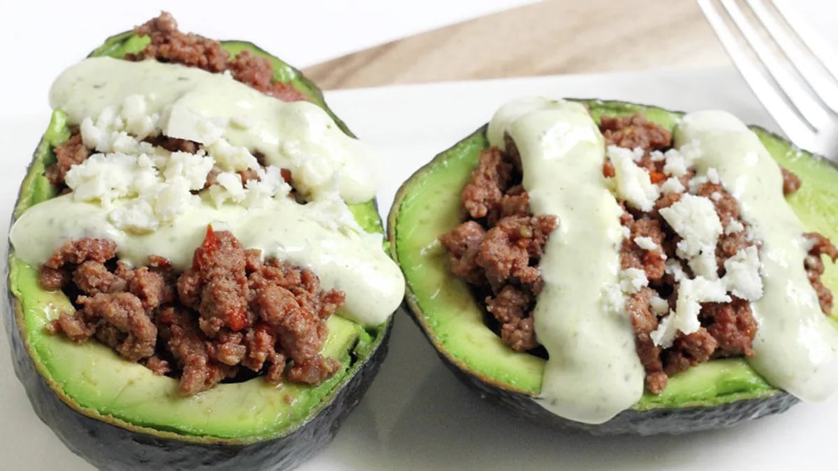 Ground Beef Stuffed Avocados with Creamy Cilantro Sauce