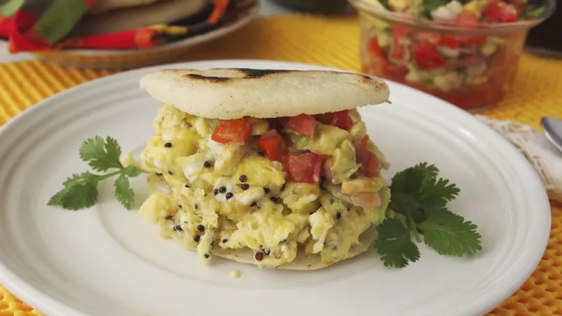Arepas with Scrambled Eggs and Tomato and Onion Sauce