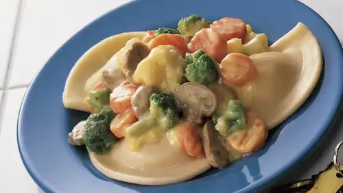 Veggie and Cheese-Topped Pierogies