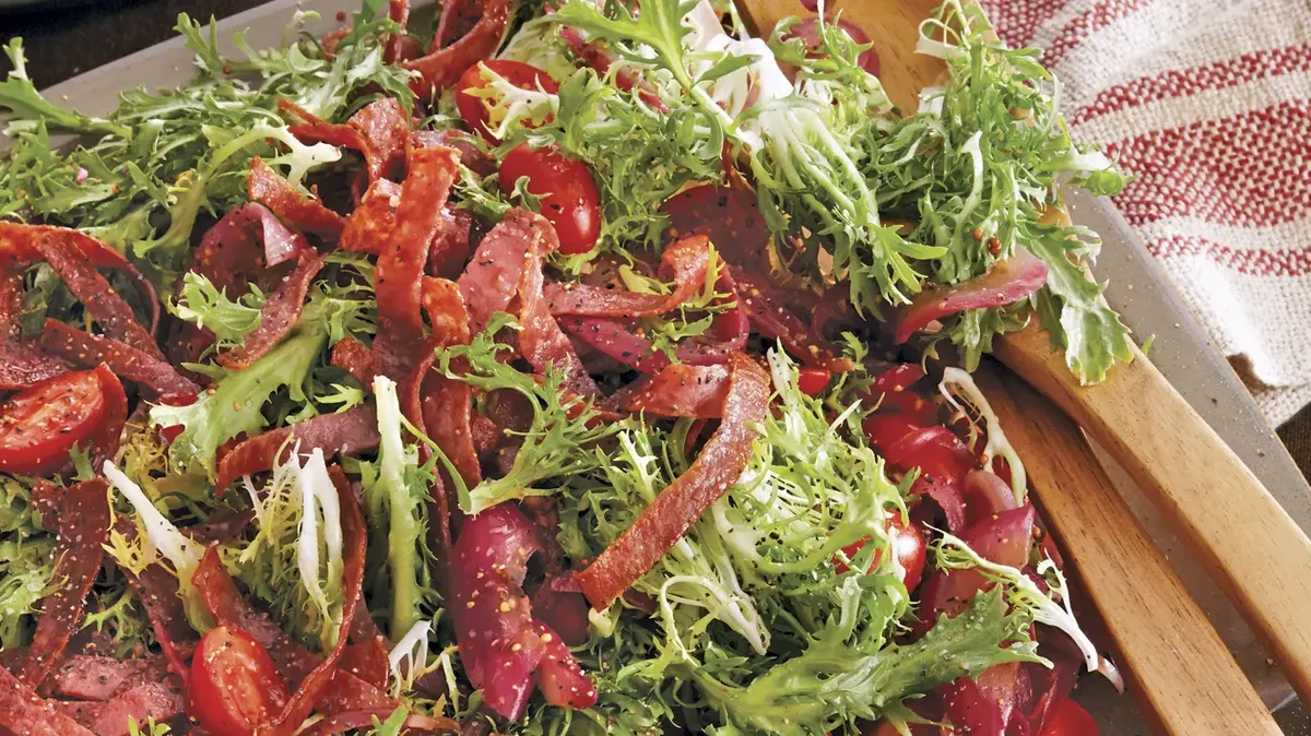 Warm Frisée Salad with Crispy Salami