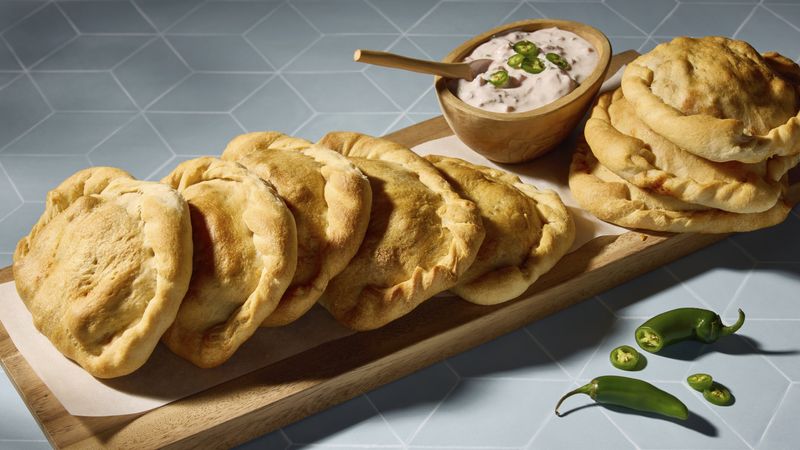 Beef and Cheese Taco Calzones Recipe - Pillsbury.com