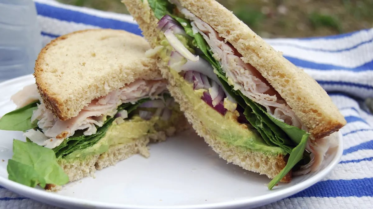 Overstuffed Turkey, Avocado & Spinach Sandwich with Lemon