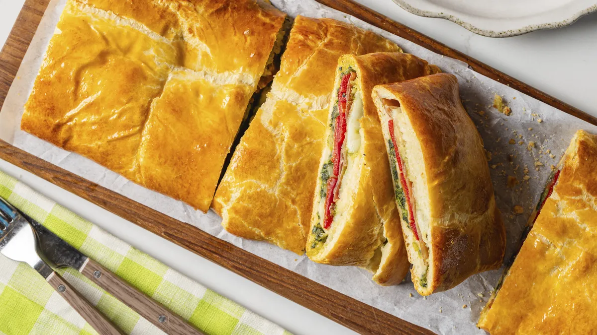 Spinach, Prosciutto, and Roasted Pepper Calzone