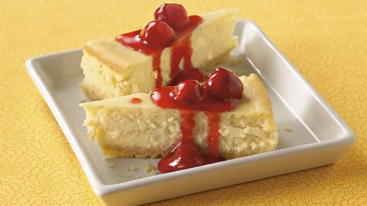 Key Lime Cheesecake with Raspberry Sauce