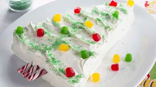 A Christmas tree cake with the baking … – License Images