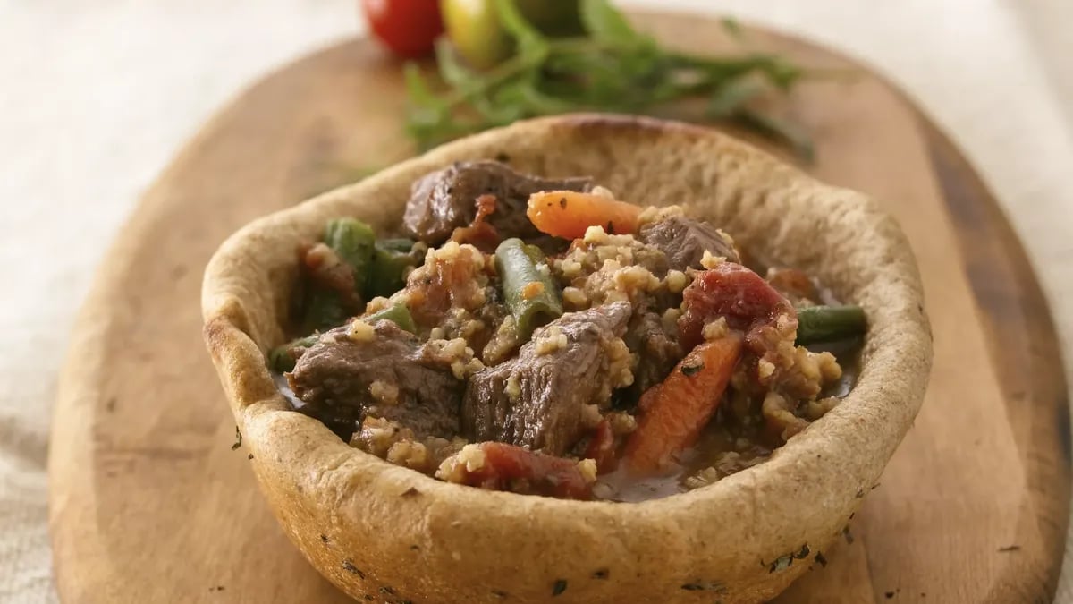 Beef and Millet Stew in Bread Bowls