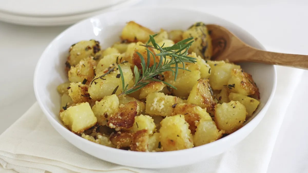 Polenta Crusted Roasted Potatoes with Herbs and Garlic