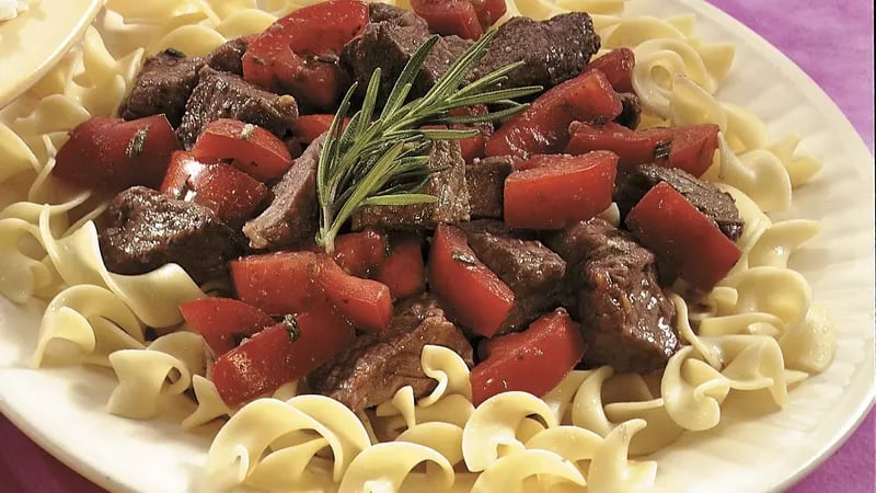 Slow-Cooked Rosemary Beef and Tomatoes over Noodles