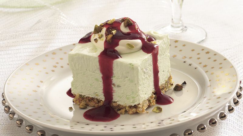 Frozen Pistachio Cream Dessert with Ruby Raspberry Sauce