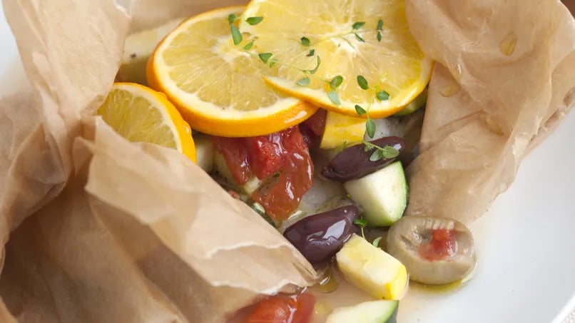 Baked Halibut with Zucchini, Olives, Tomatoes and Oranges