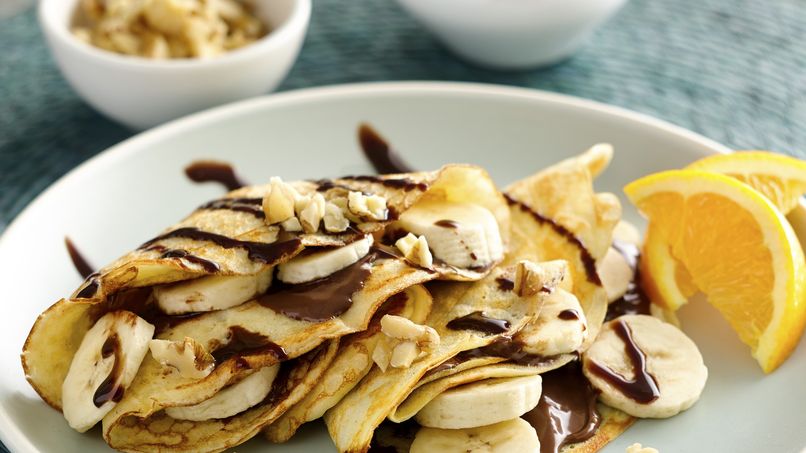 Crepes Filled with Banana, Hazelnut Cream and Nuts