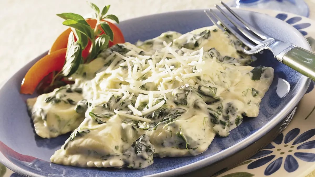 Ravioli in Spinach Alfredo Sauce