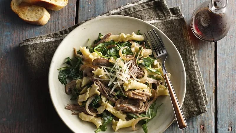 Creamy Pulled Pork Pasta with Caramelized Onions, Mushrooms and Arugula