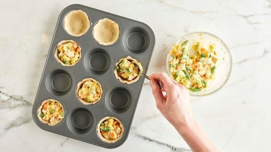 Mini Chicken Pot Pies (made with canned biscuit dough!) - Laughing Spatula