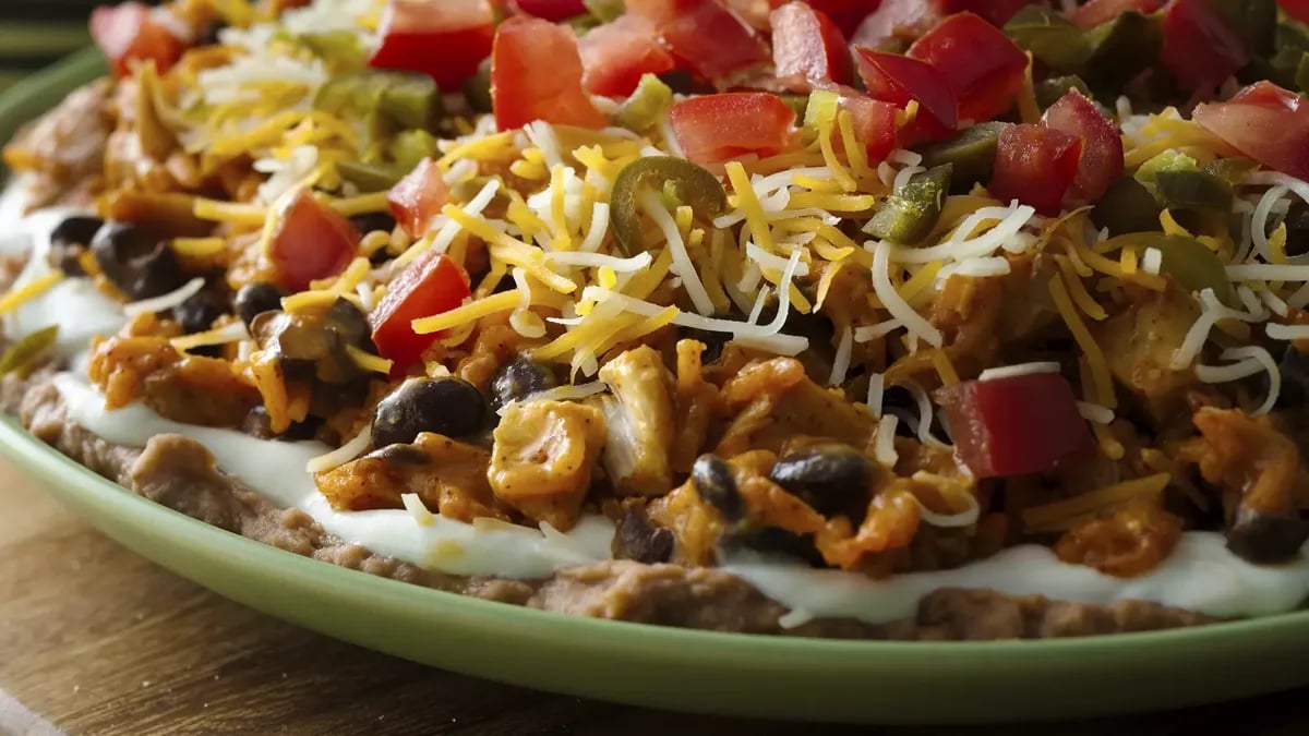 Seven Layer Chicken Enchilada Dip