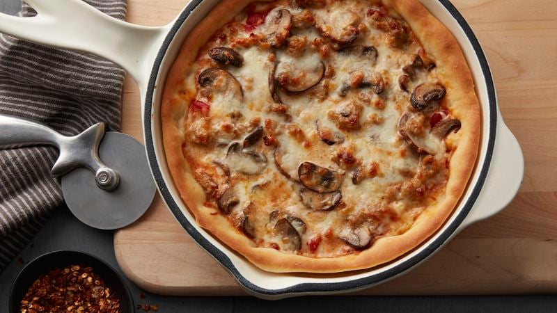 Easy Sausage Cast Iron Skillet Pizza - Serving Dumplings