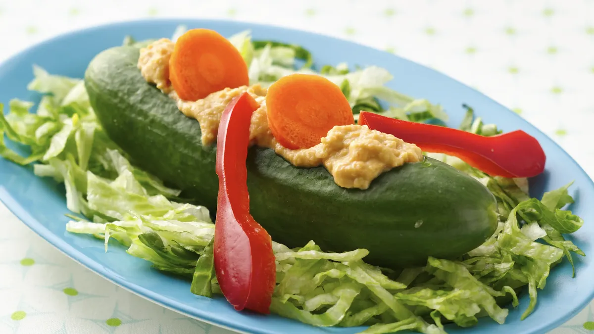 Carrot Hummus Filled Cucumber Canoes