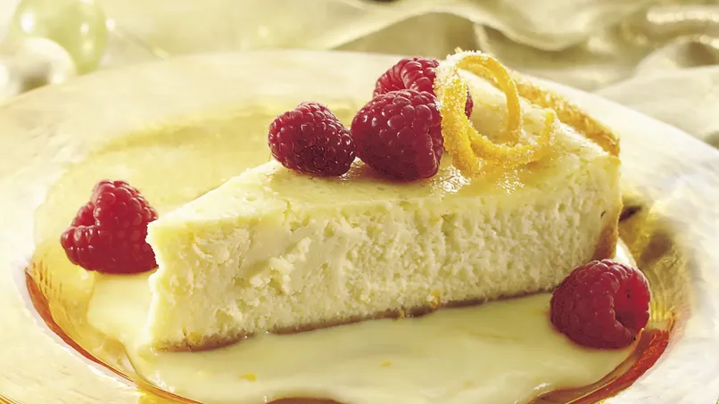 Luscious Orange Cheesecake with Raspberries