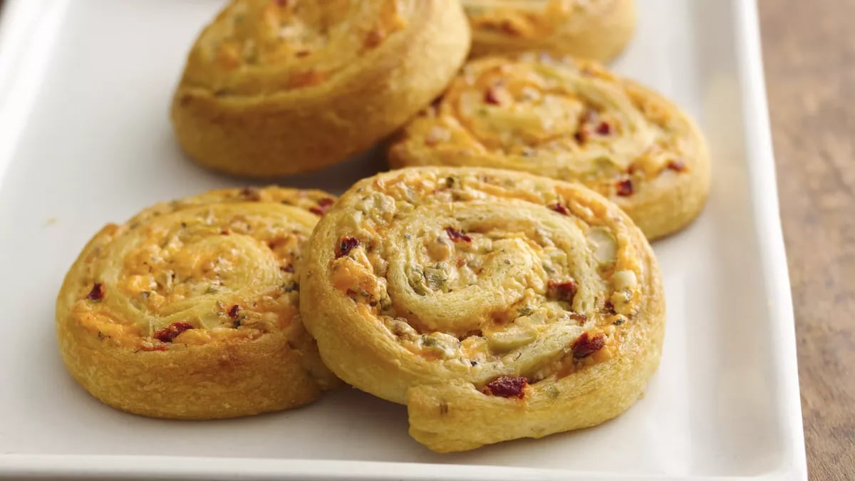 Cheesy Olive-Bacon Crescent Spirals