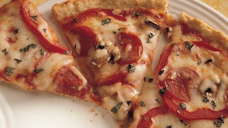 These Homemade Pizza Tips Ensure Your Pie Tastes Like the Real