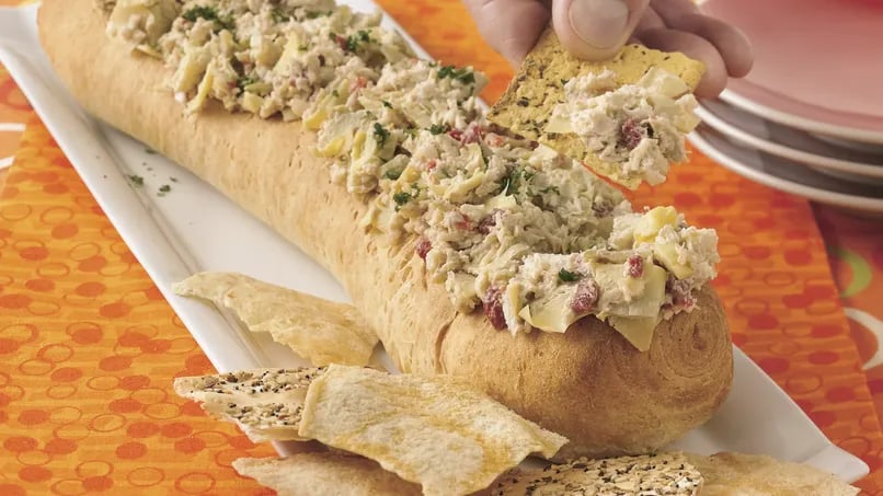 Crusty Bread Boat with Crab and Artichoke Spread