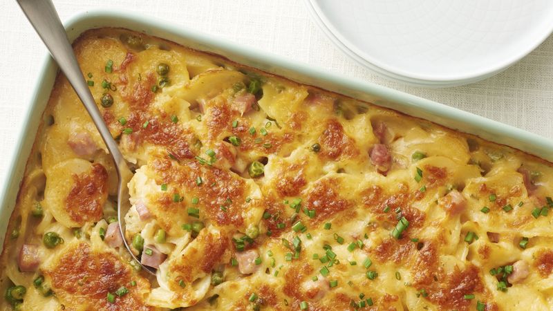 Creamy Scalloped Potatoes with Ham and Peas