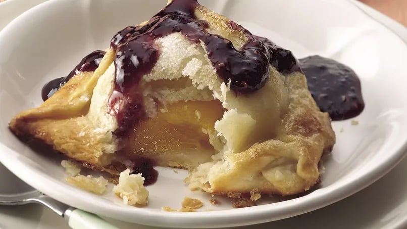 Peach Dumplings with Raspberry Sauce