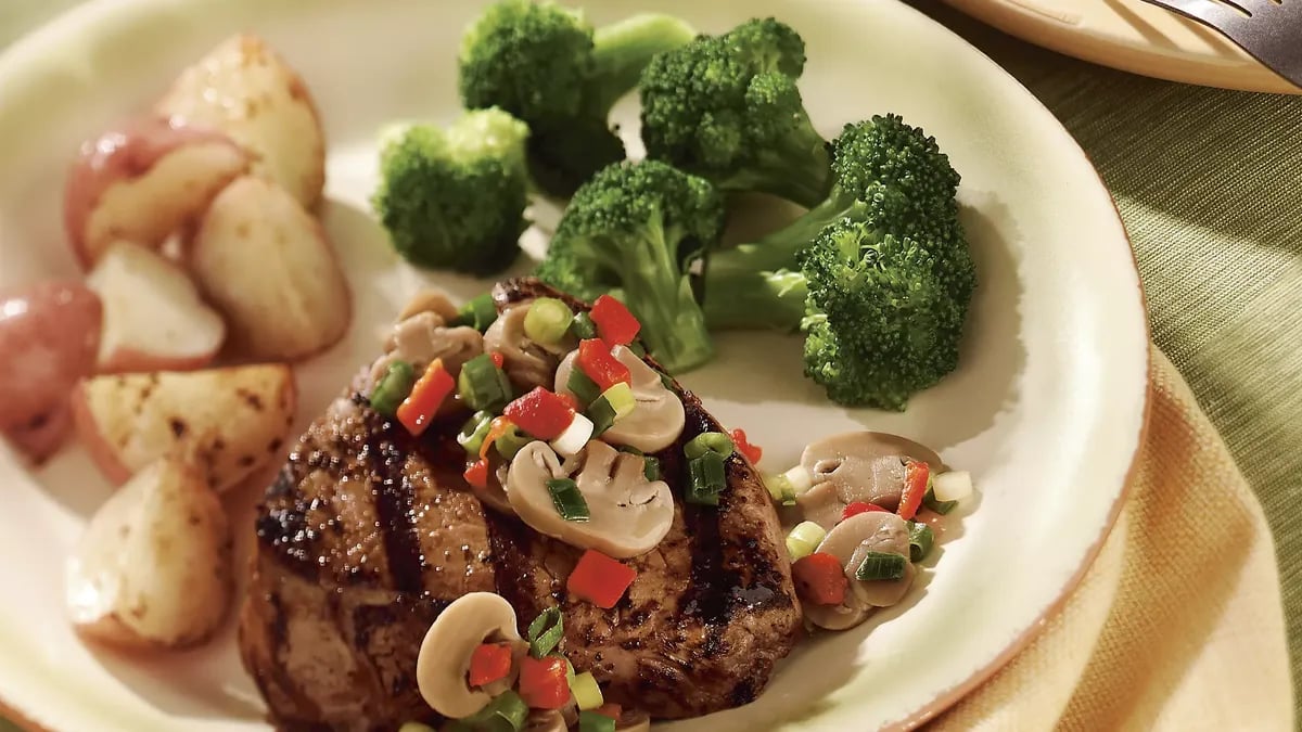 Mushroom and Onion-Topped Steak