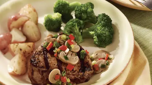 Mushroom and Onion-Topped Steak