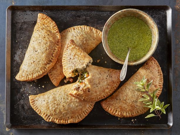 Braised Kale, Sausage, and Potato Hand Pies with Pesto Dipping Sauce