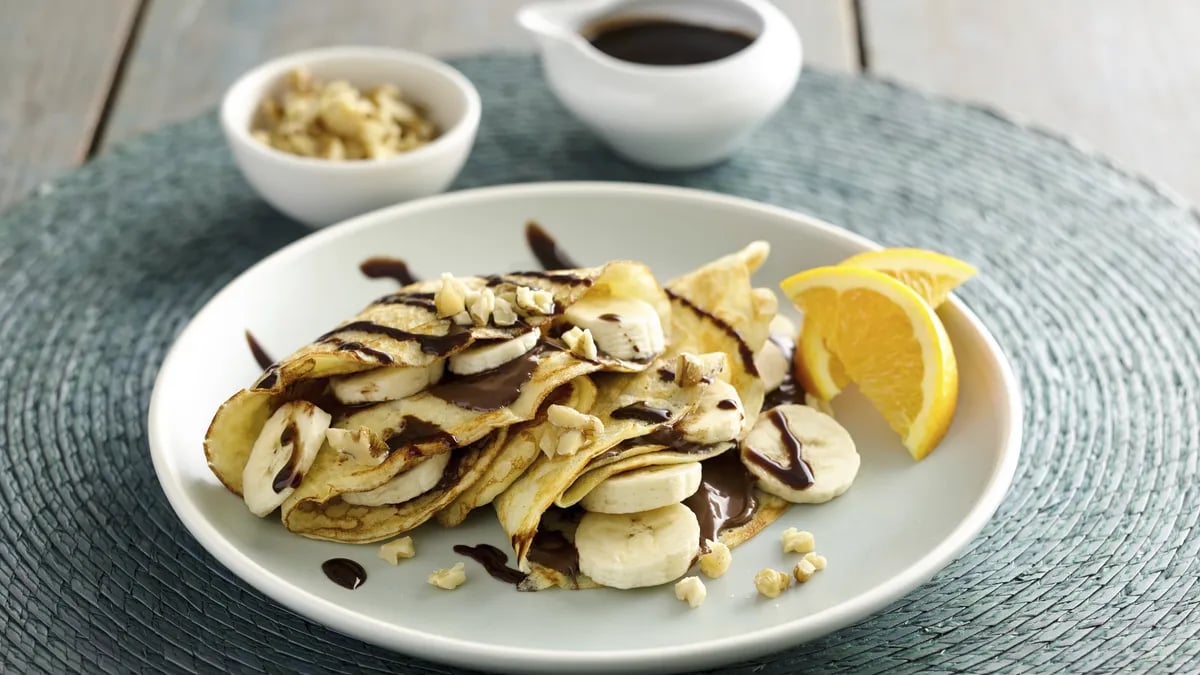 Crepes Filled with Banana, Hazelnut Cream and Nuts