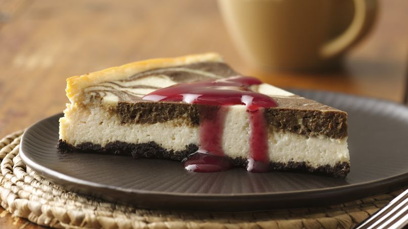 Chocolate Swirl Cheesecake with Raspberry Sauce