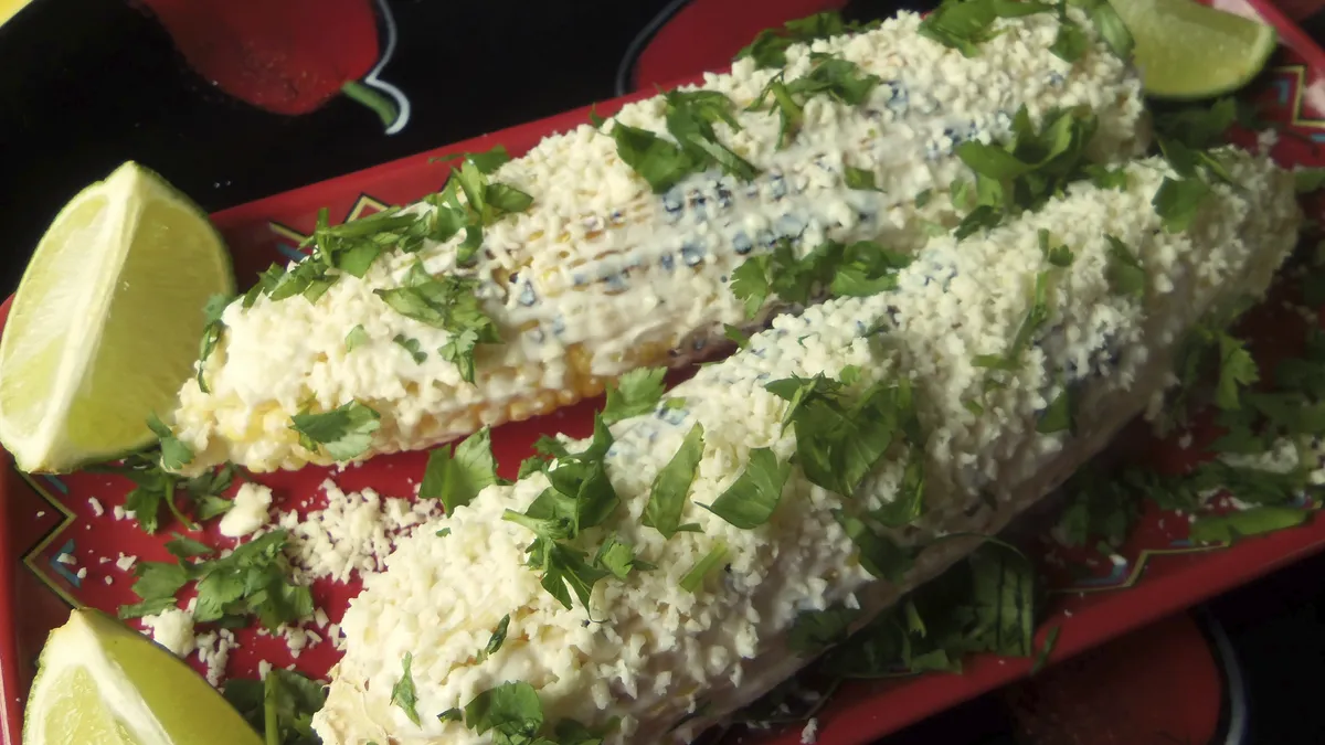 Grilled Corn with Lime Crema, Cotija Cheese & Cilantro