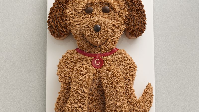 Dog shaped top birthday cake