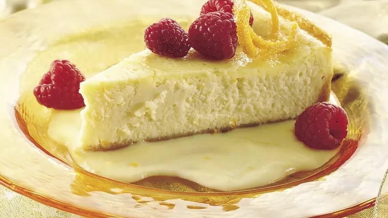 Luscious Orange Cheesecake with Raspberries