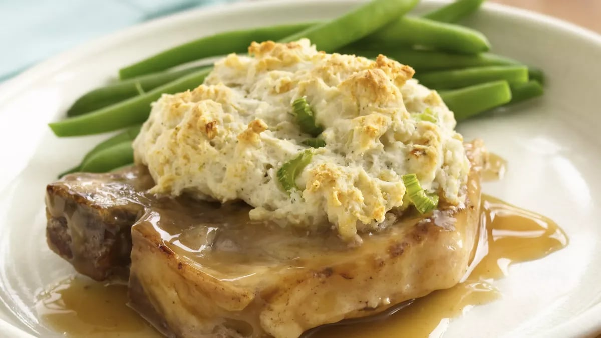 Gravy Pork Chops with Stuffing Biscuits