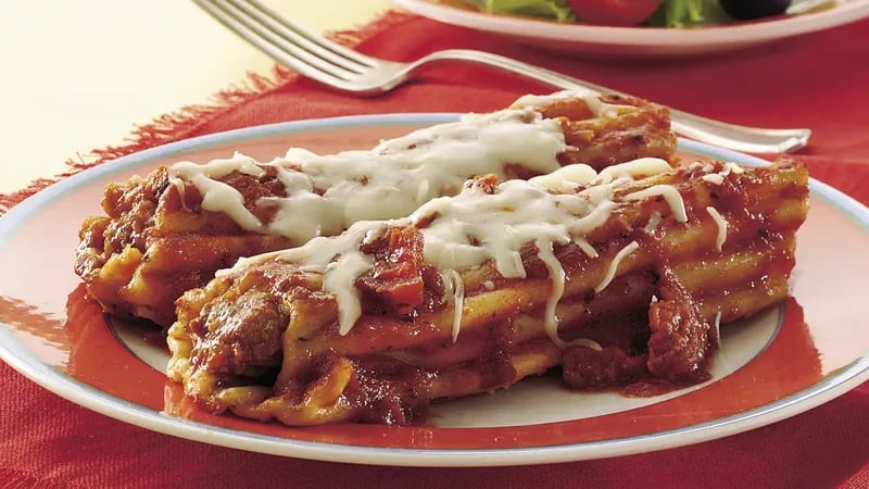 Shortcut Sausage-Stuffed Manicotti with Sun-Dried Tomato Sauce